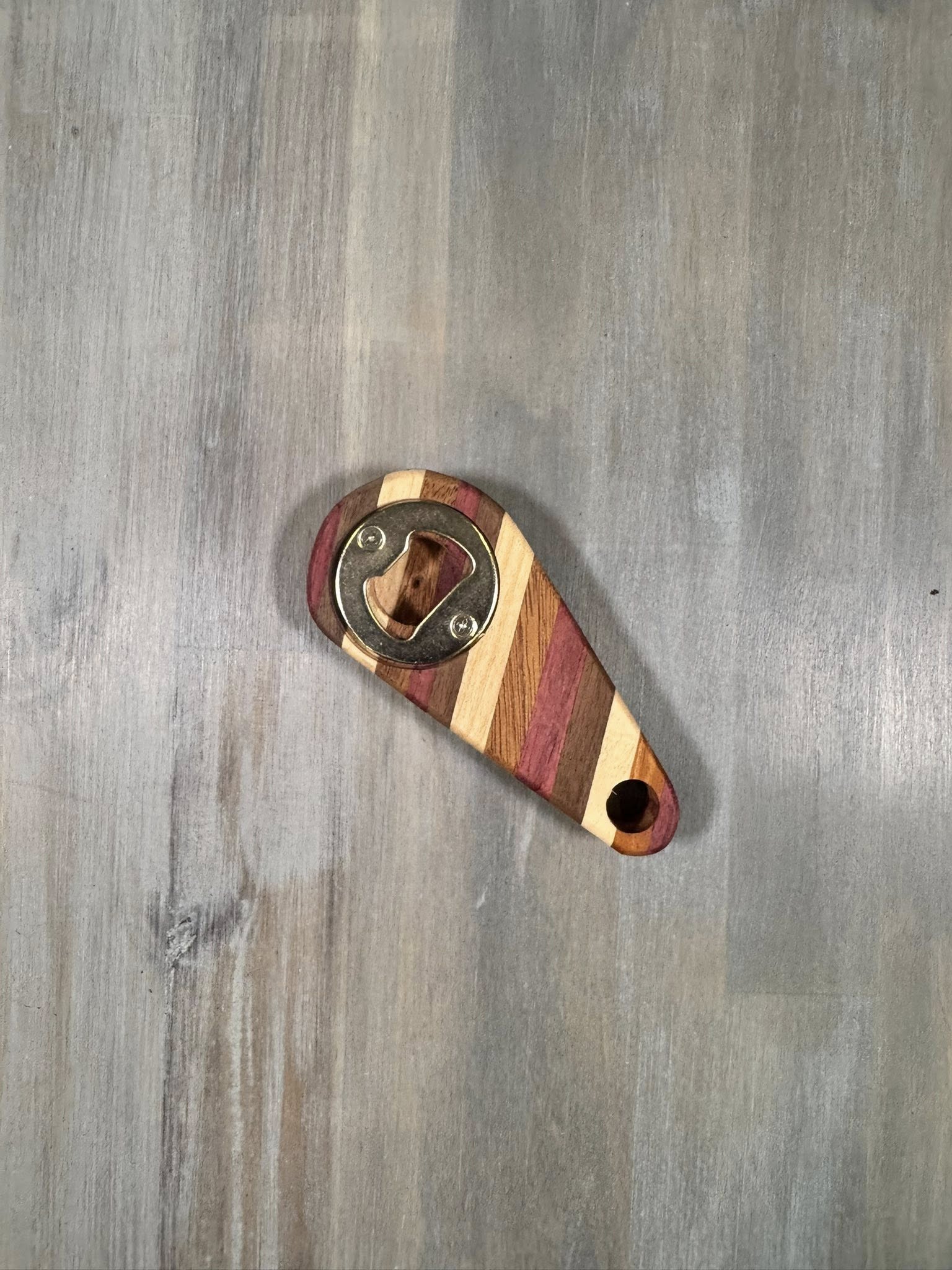 With the Gritz Exotic Handheld Bottle Opener | Hang Hole