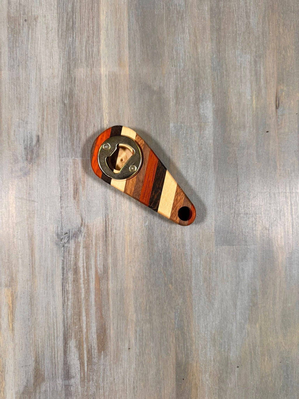 With the Gritz Exotic Handheld Bottle Opener | Hang Hole
