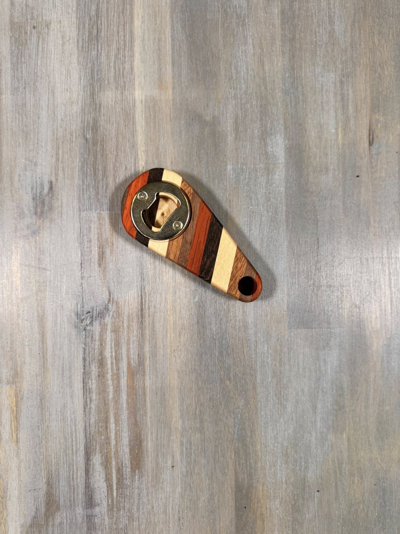 With the Gritz Exotic Handheld Bottle Opener | Hang Hole