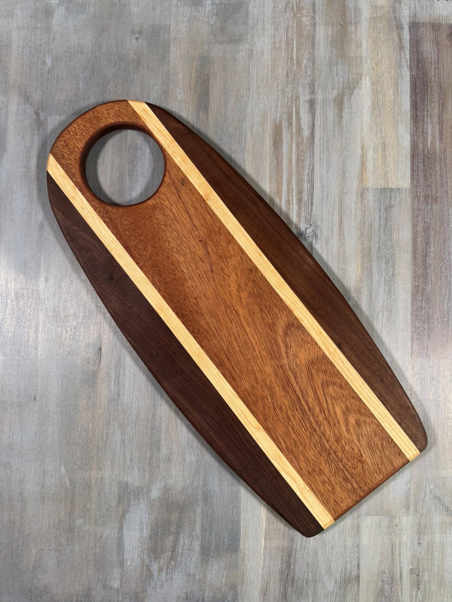 With the Gritz Custom Flat Oval Cutting Board