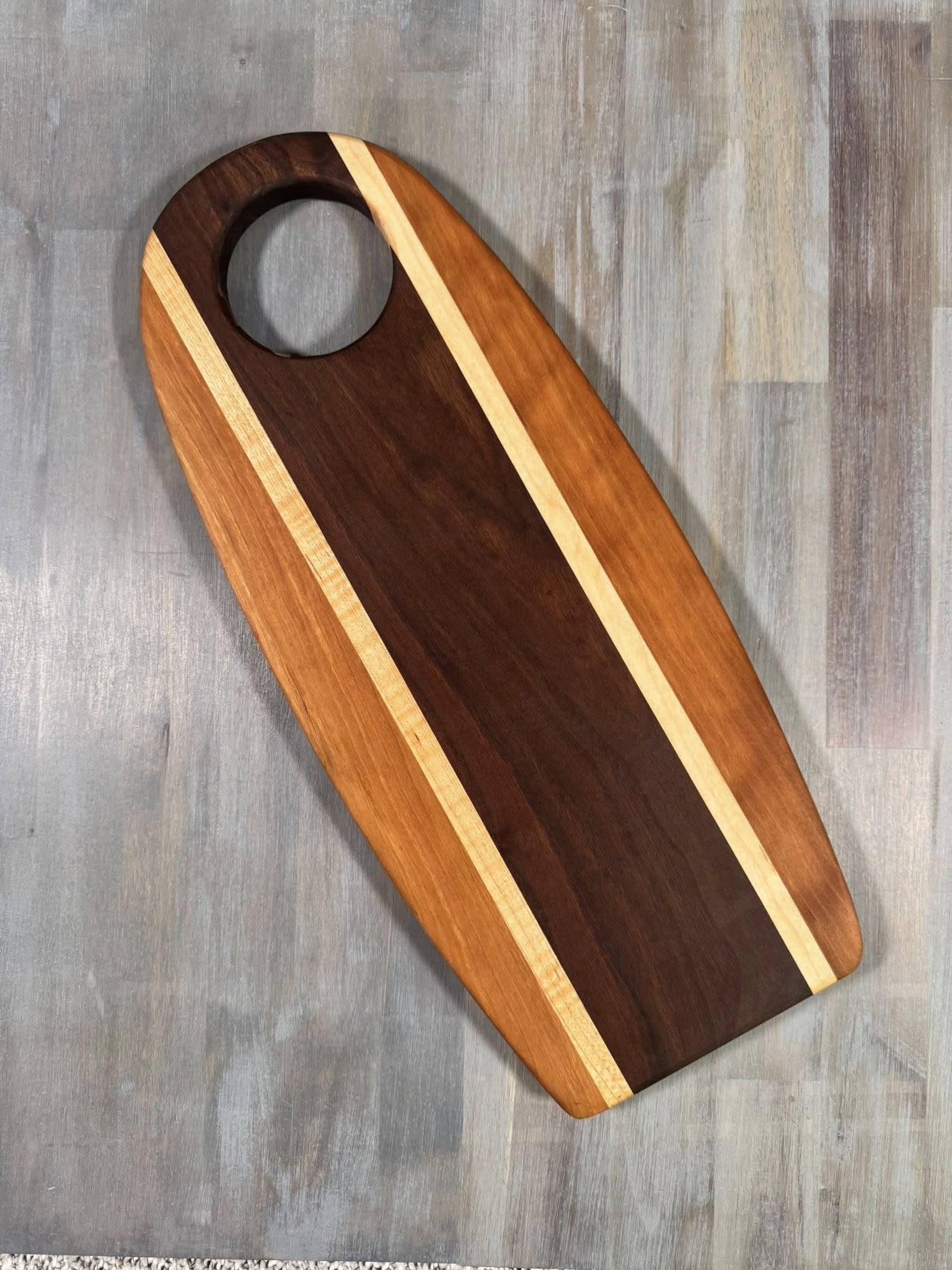 With the Gritz Custom Flat Oval Cutting Board