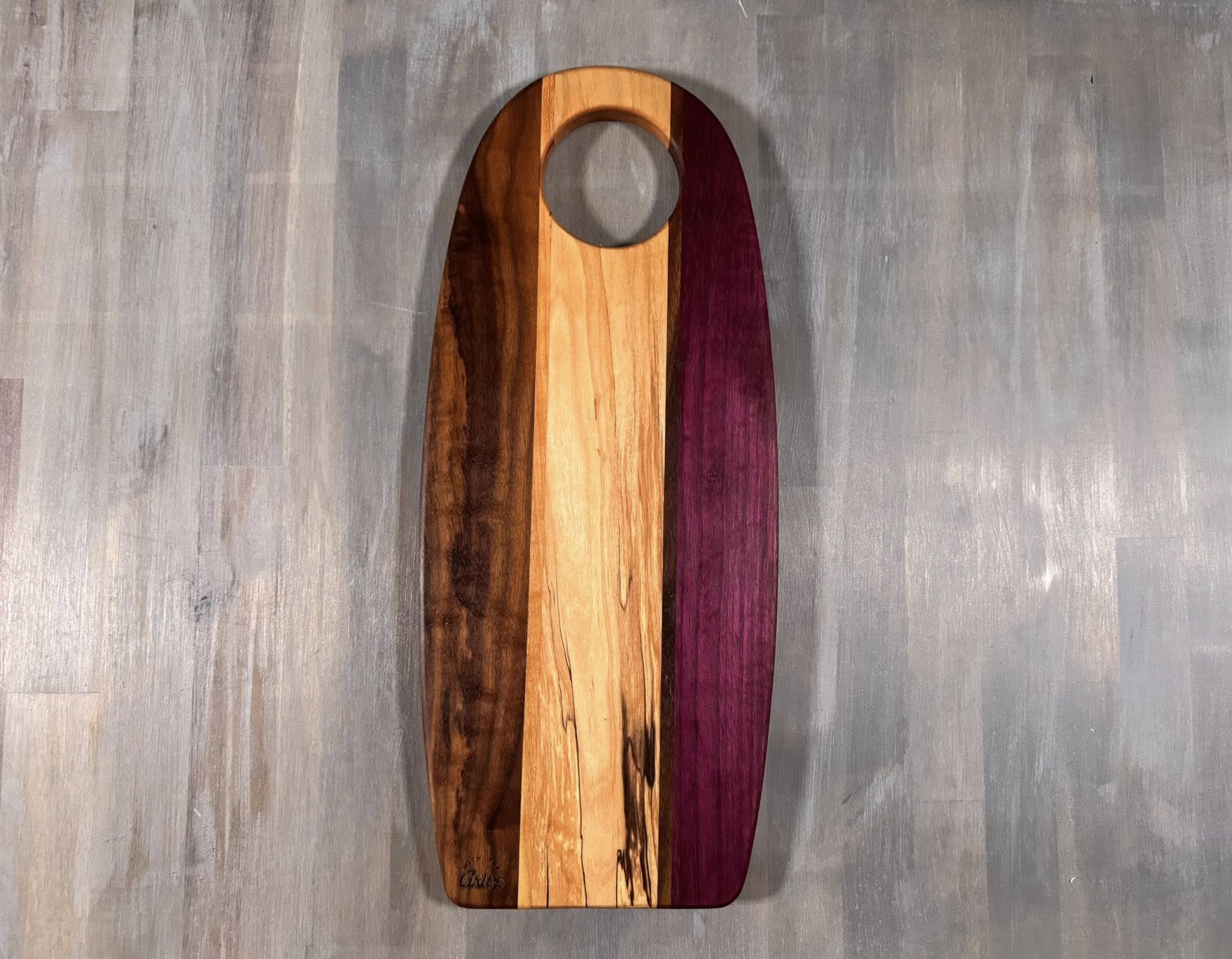 With the Gritz Custom Flat Oval Cutting Board
