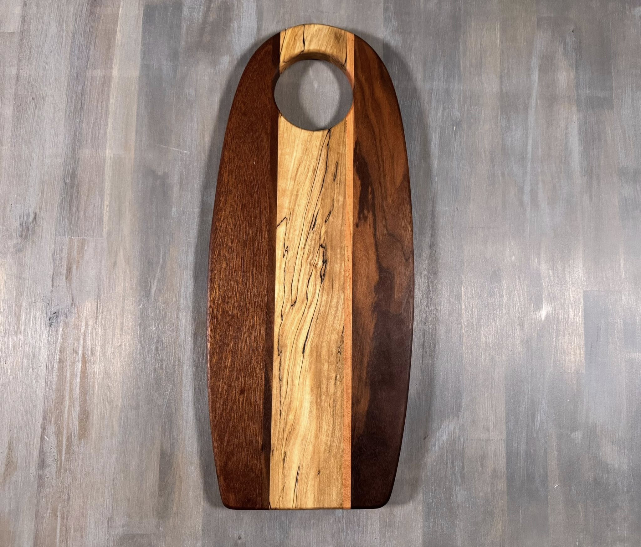 With the Gritz Custom Flat Oval Cutting Board