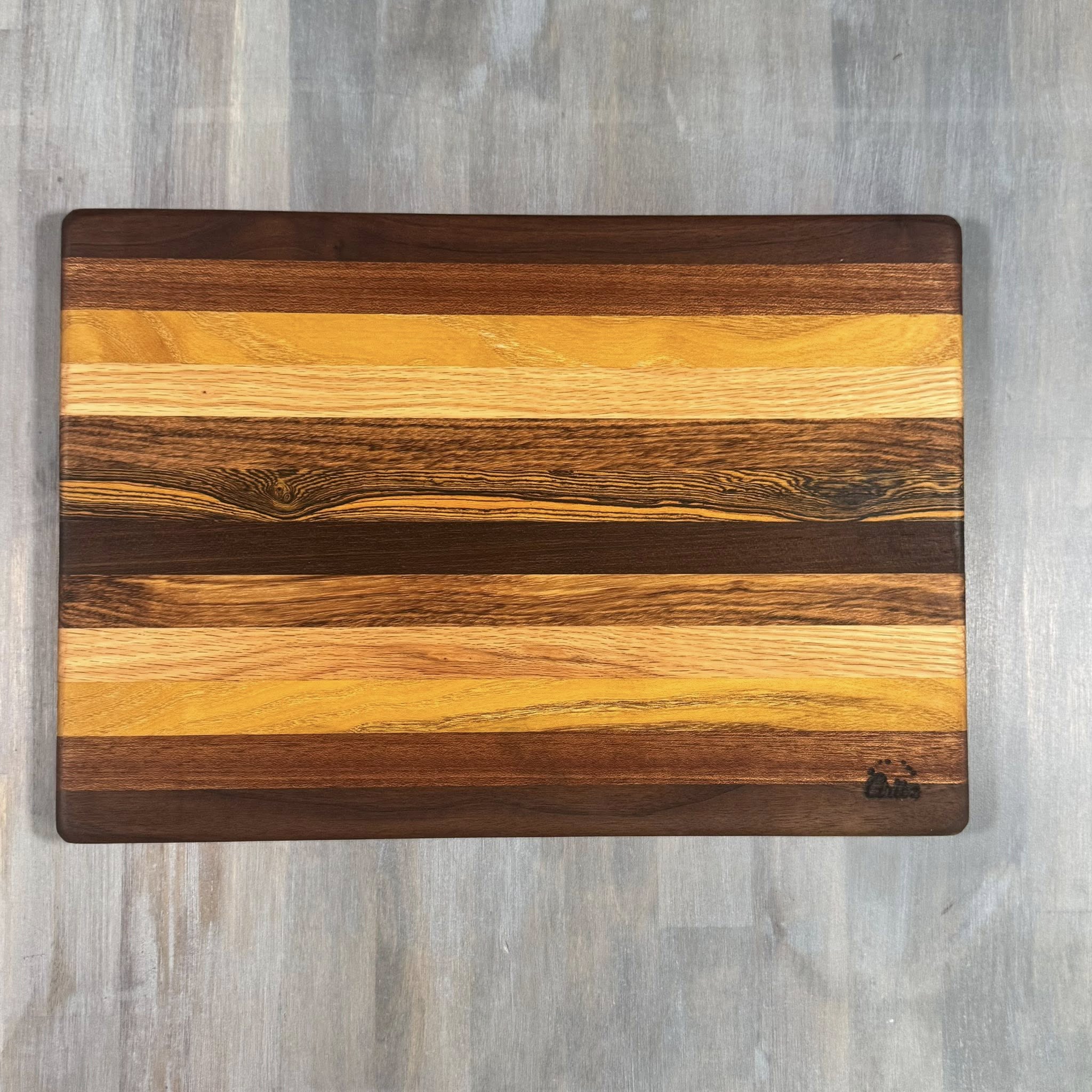 With the Gritz Classic Rectangle Cutting Board | 15x10 | Assorted Wood