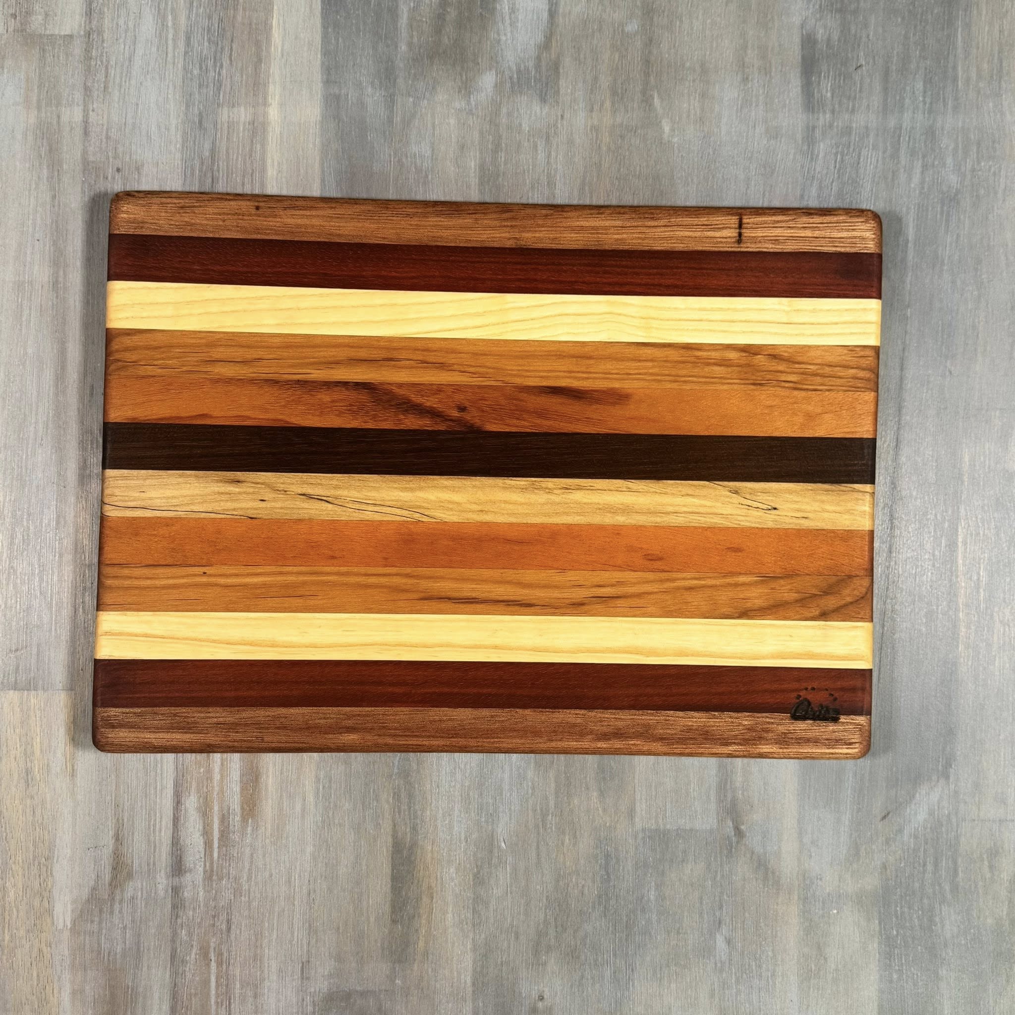 With the Gritz Classic Rectangle Cutting Board | 15x10 | Assorted Wood