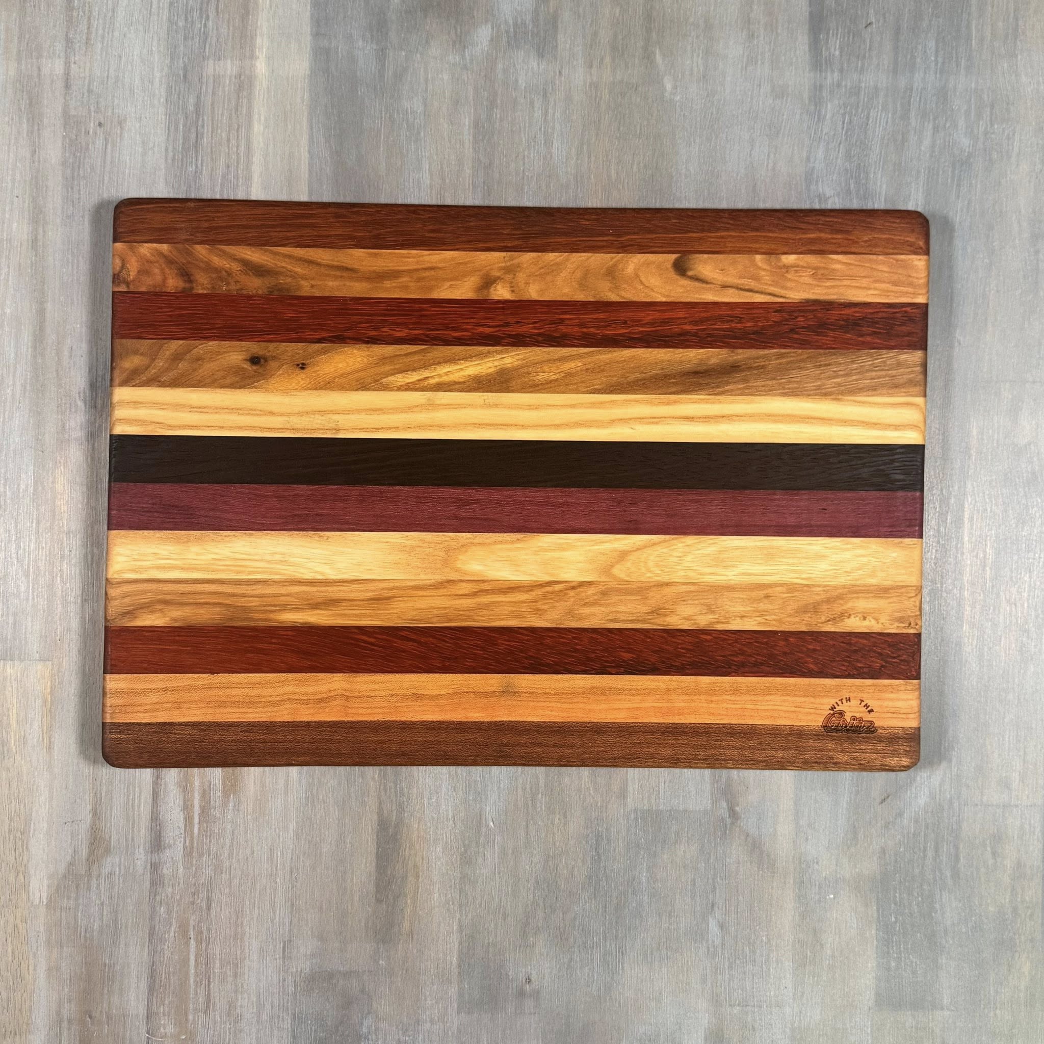 With the Gritz Classic Rectangle Cutting Board | 15x10 | Assorted Wood (Copy)