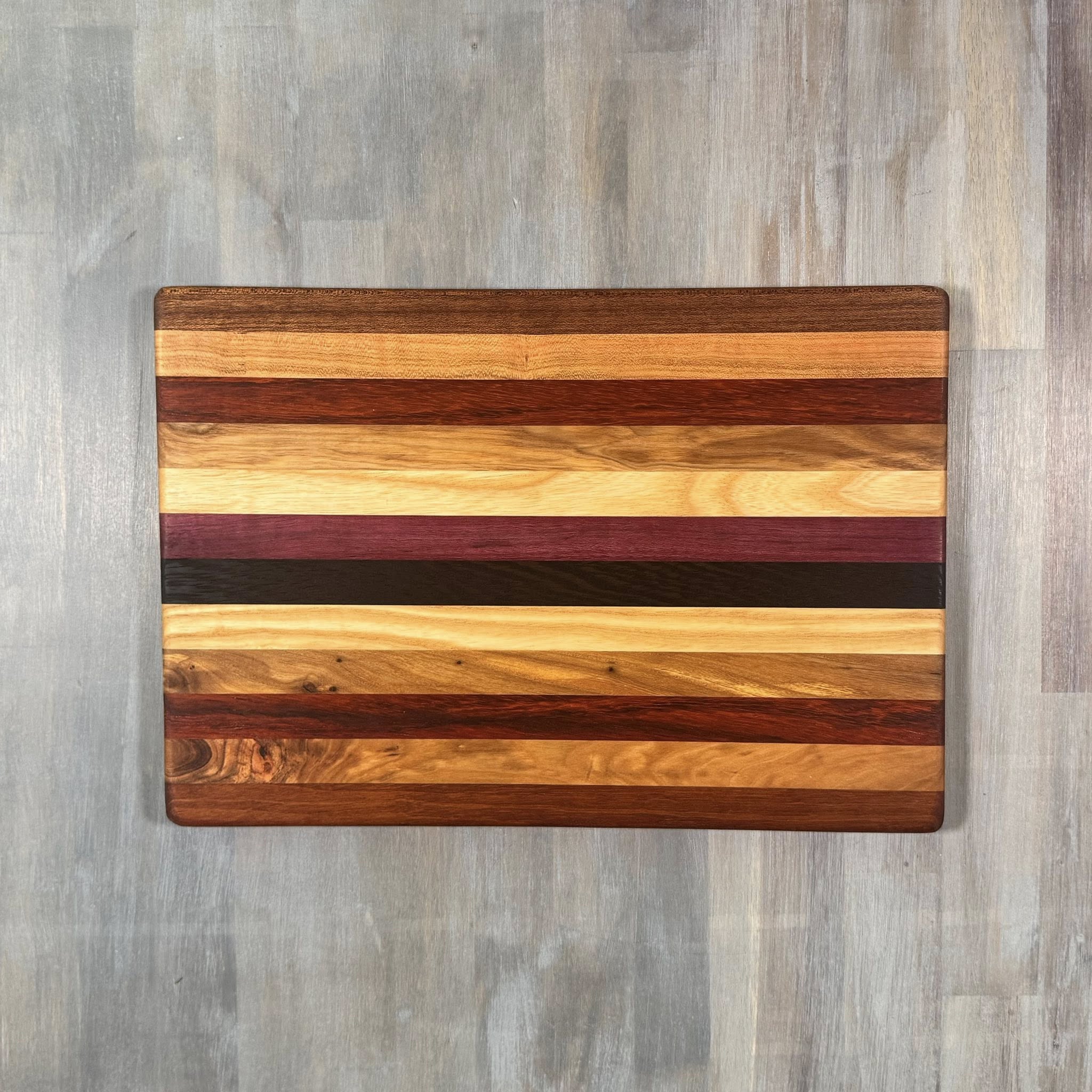 With the Gritz Classic Rectangle Cutting Board | 15x10 | Assorted Wood (Copy)