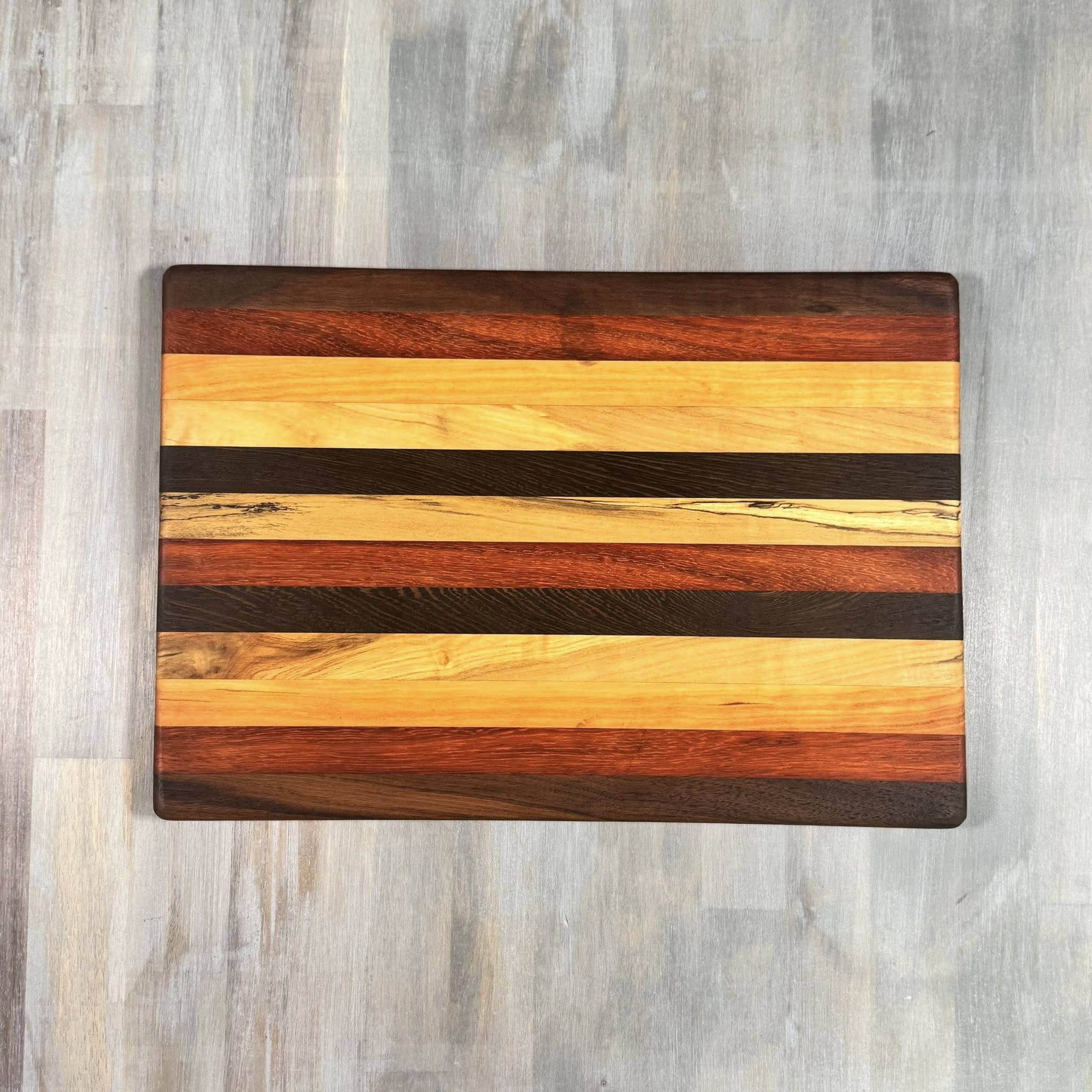 With the Gritz Classic Rectangle Cutting Board | 15x10 | Assorted Wood
